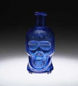 Old cobalt glass Bottle for poison.  Such bottles were used to hold compounds such as Arsenic-based medicines like Arsenicious Acid Granules which was ironically a common poison used to commit suicide and murder.  Today's corporations would never produce such bottles as they don't like us to know our household products can be deadly.